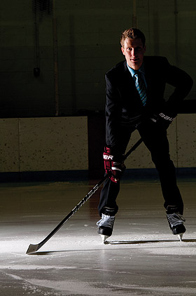 Picture of hockey player in a suit