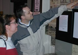 Two students looking at a display at the workshop.