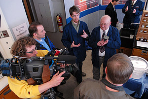 Picture of media interviewing Brian Krohn and Professor Gyberg.
