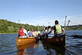 Picture of people in canoes on the river