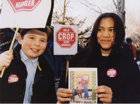 picture of kids holding Crop Walk signs