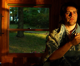 Picture of man by window