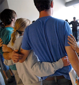 Picture of students with arms around each other