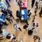 overhead view of students mingling in Hoversten Chapel during career fair