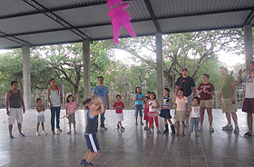 Picture of children playing with a pinata